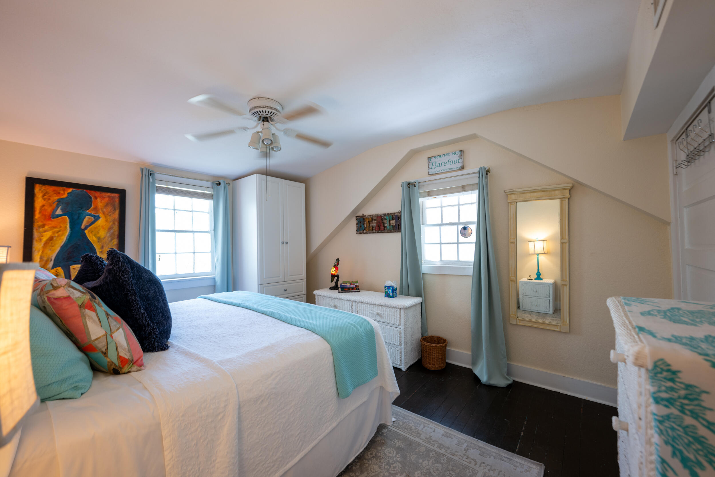 1109 Stump Lane Key West, FL 33040 - Photo 31 of 38 a bedroom with a bed and a chandelier