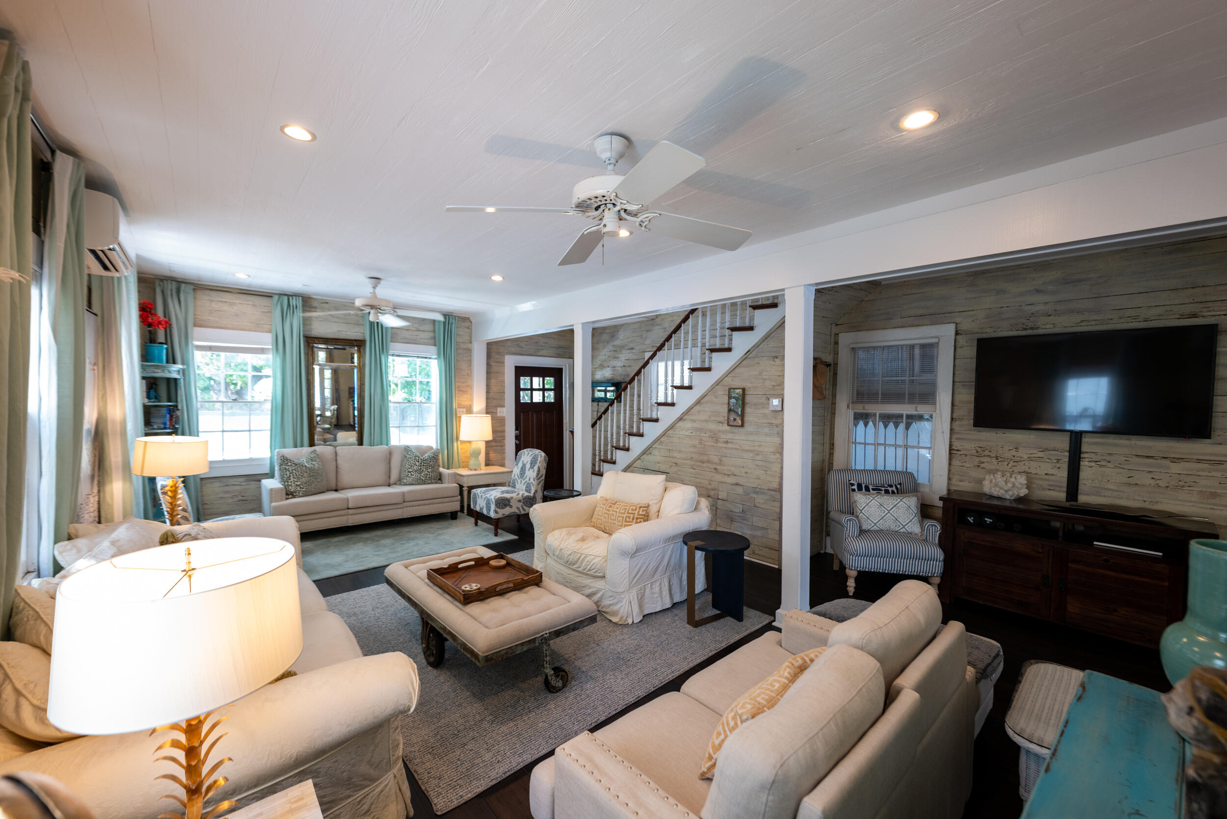 1109 Stump Lane Key West, FL 33040 - Photo 34 of 38 a living room with furniture and a flat screen tv