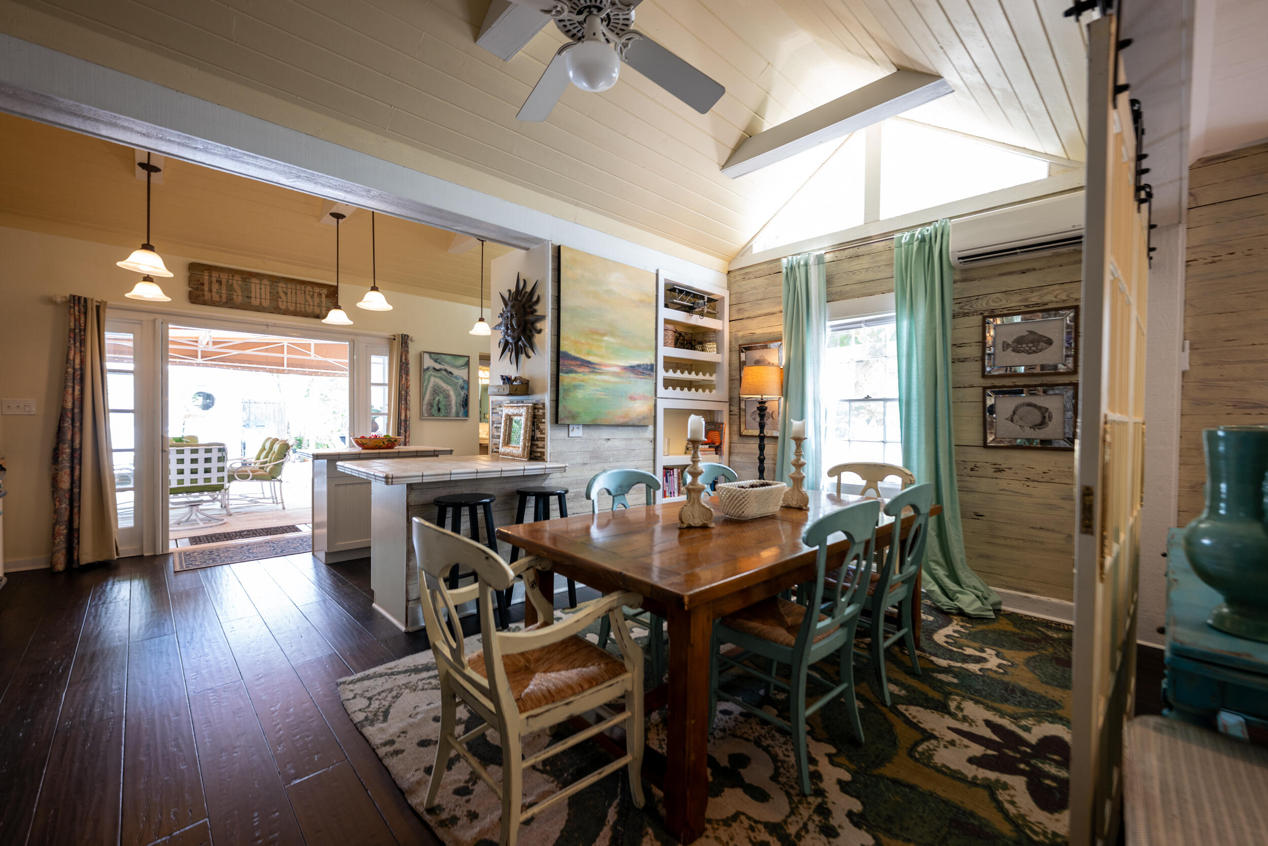 1109 Stump Lane Key West, FL 33040 - Photo 35 of 38 a view of a dining room with furniture and wooden floor