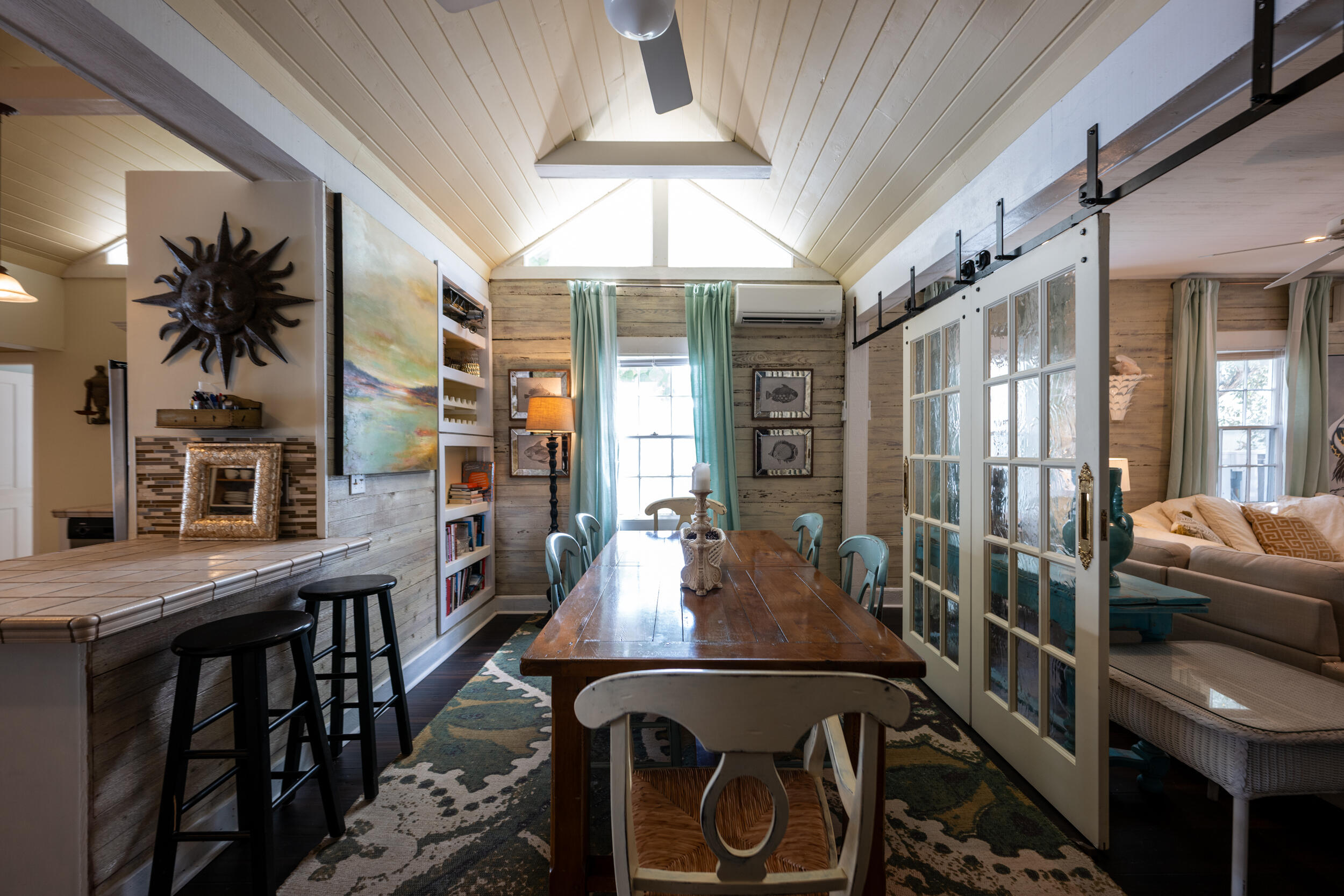 1109 Stump Lane Key West, FL 33040 - Photo 36 of 38 a view of a dining room with furniture window and wooden floor