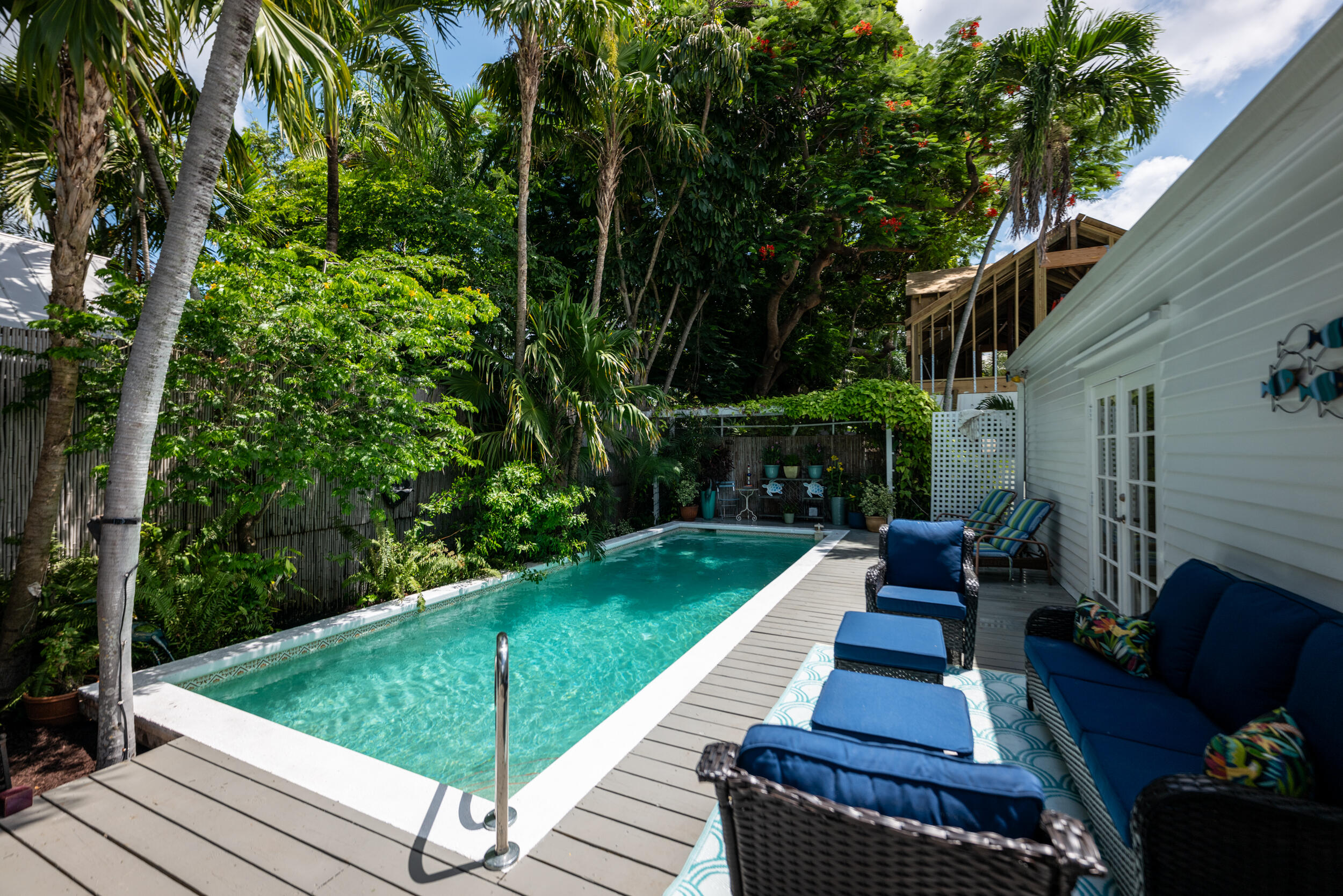 1109 Stump Lane Key West, FL 33040 - Photo 8 of 38 a view of a backyard with sitting area