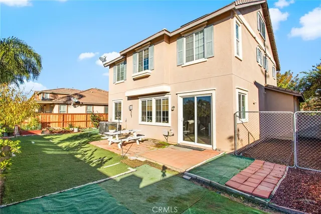 an aerial view of residential houses and outdoor space