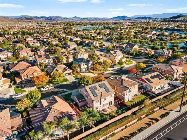 a view of backyard with outdoor seating and hardwood