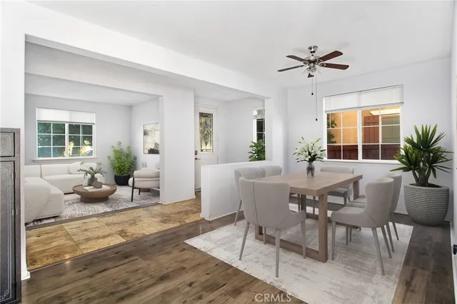 a view of a dining room with furniture and window