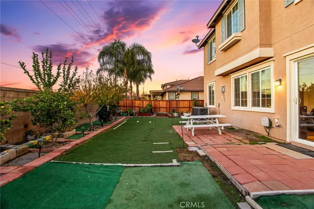 an aerial view of a house with a lake view