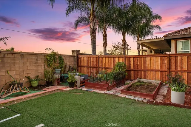 an aerial view of residential houses with outdoor space lake view