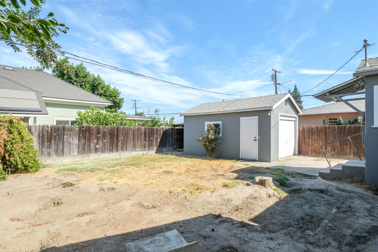 2043 11th Street Reedley, CA 93654 - Photo 20 of 21 a view of a house with a yard