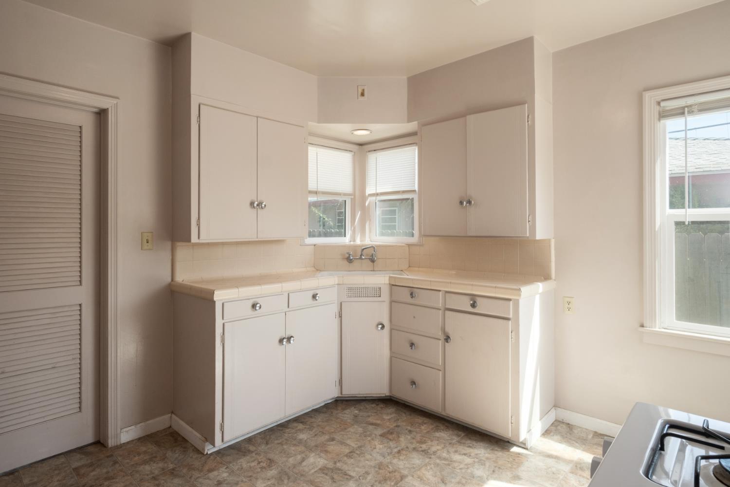 2043 11th Street Reedley, CA 93654 - Photo 8 of 21 a view of a sink and cabinets