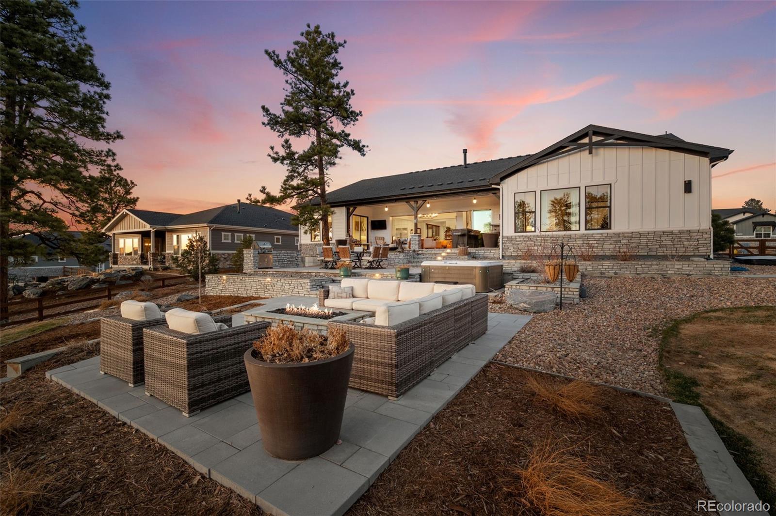 6001 Powell Road Parker, CO 80134 - Photo 45 of 50 a view of a house with backyard and sitting area