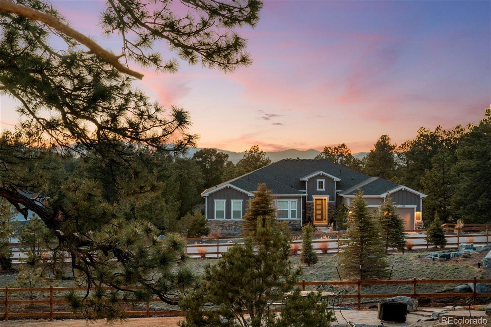 6001 Powell Road Parker, CO 80134 - Photo 46 of 50 a front view of a house with a yard