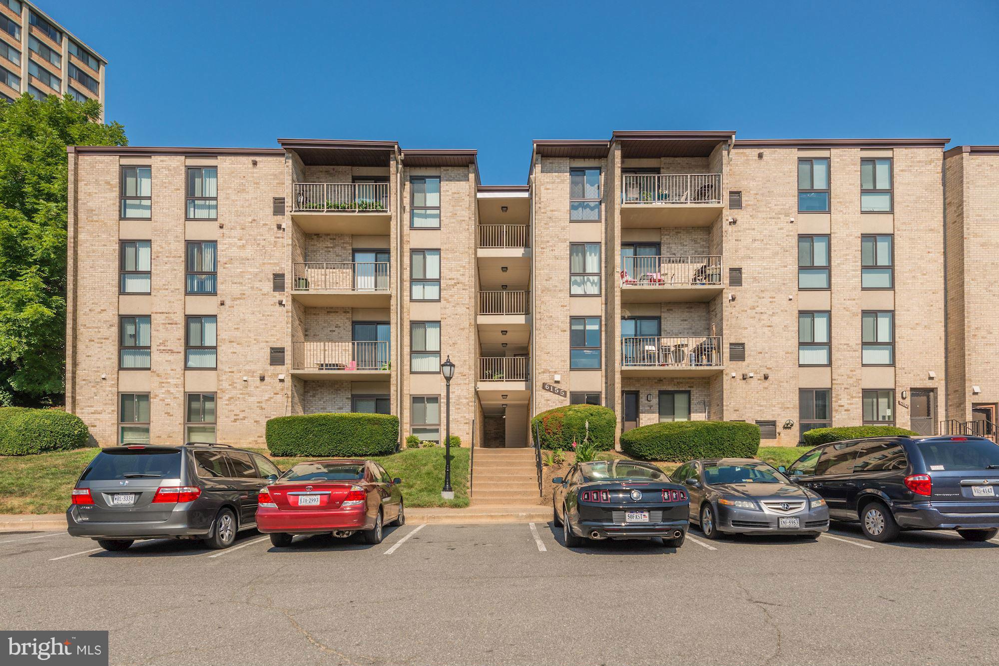 a car parked in front of a building