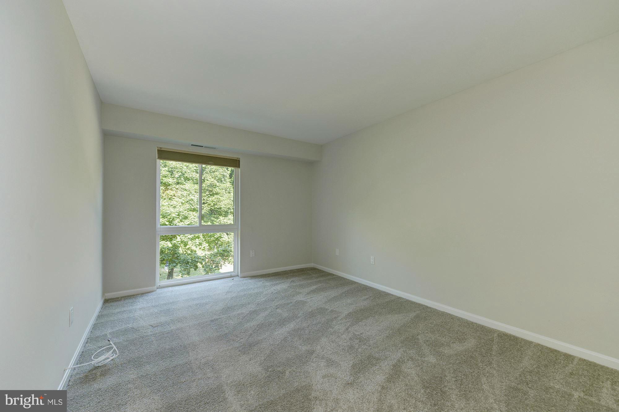 6155 Edsall Road, Unit H Alexandria, VA 22304 - Photo 17 of 30 an empty room with a window
