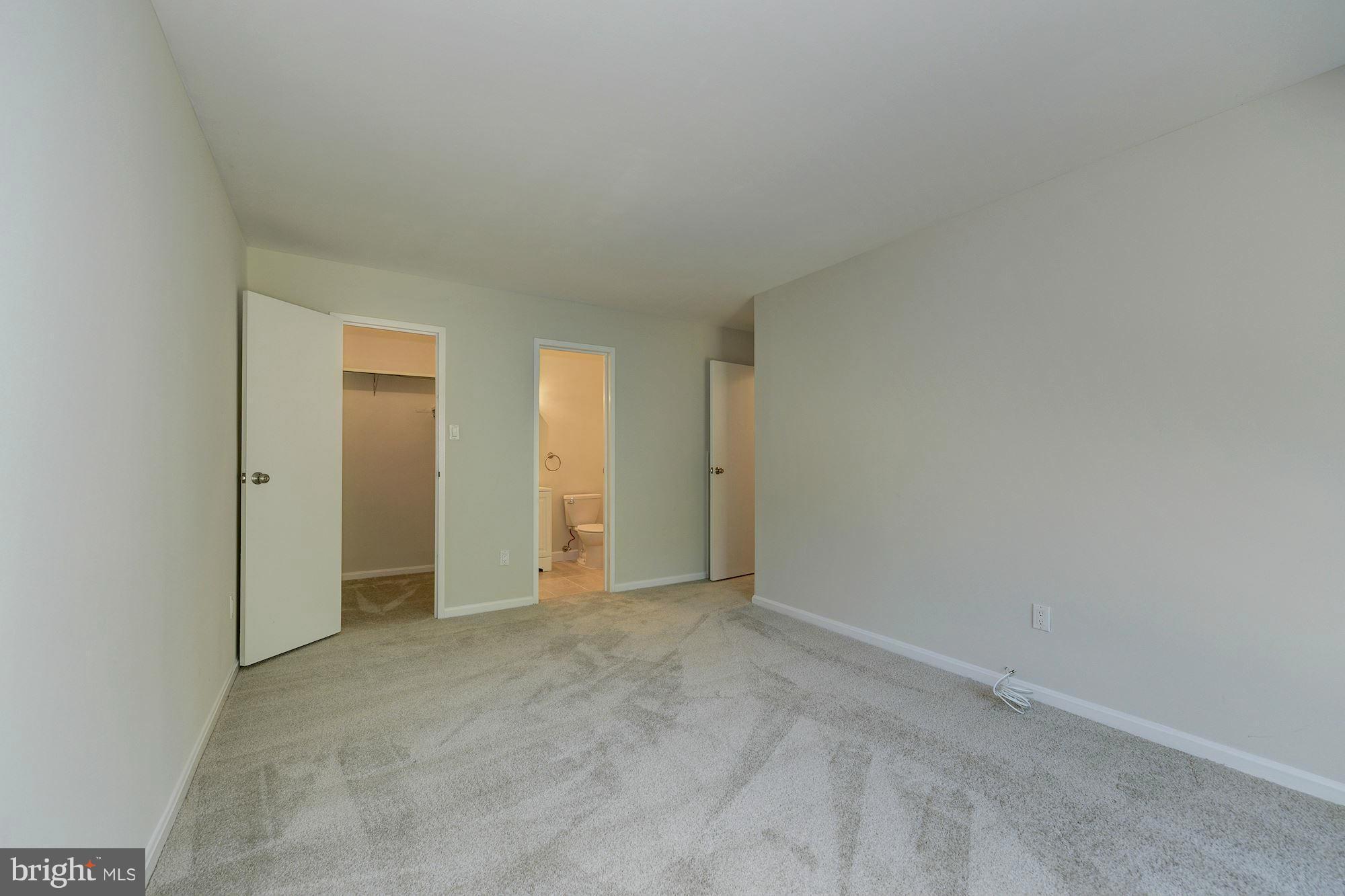6155 Edsall Road, Unit H Alexandria, VA 22304 - Photo 19 of 30 a view of an empty room and closet area