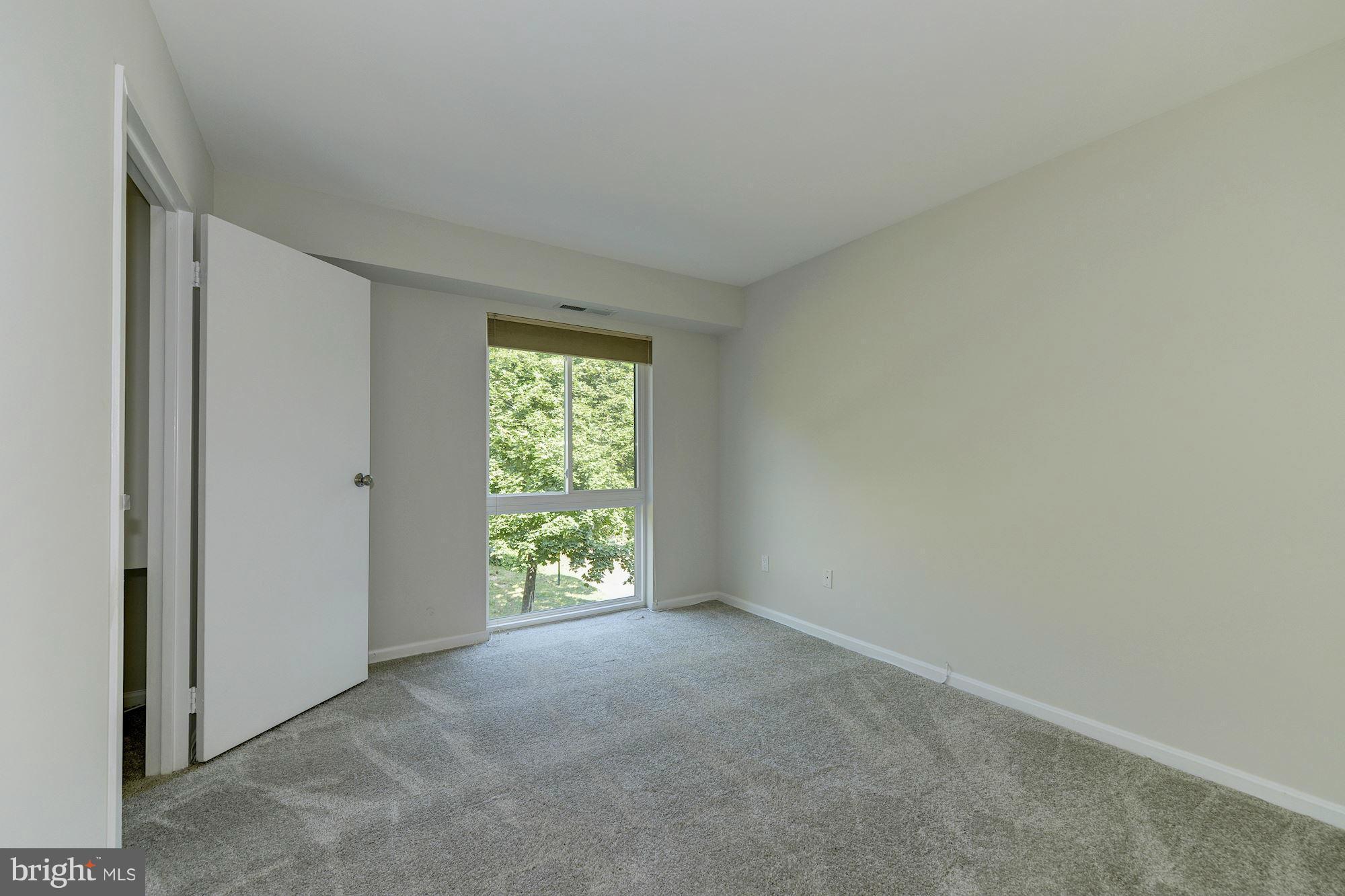 6155 Edsall Road, Unit H Alexandria, VA 22304 - Photo 22 of 30 a view of an empty room with a window