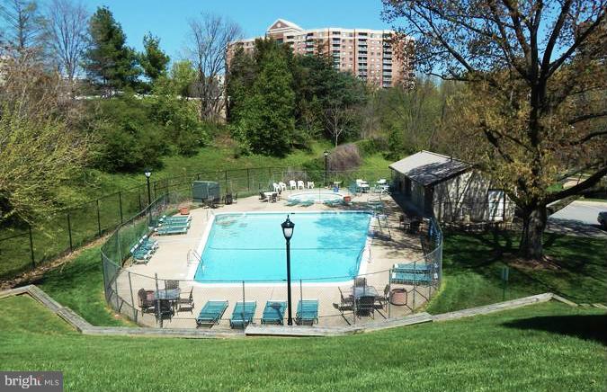 6155 Edsall Road, Unit H Alexandria, VA 22304 - Photo 30 of 30 a view of a wooden deck and a yard