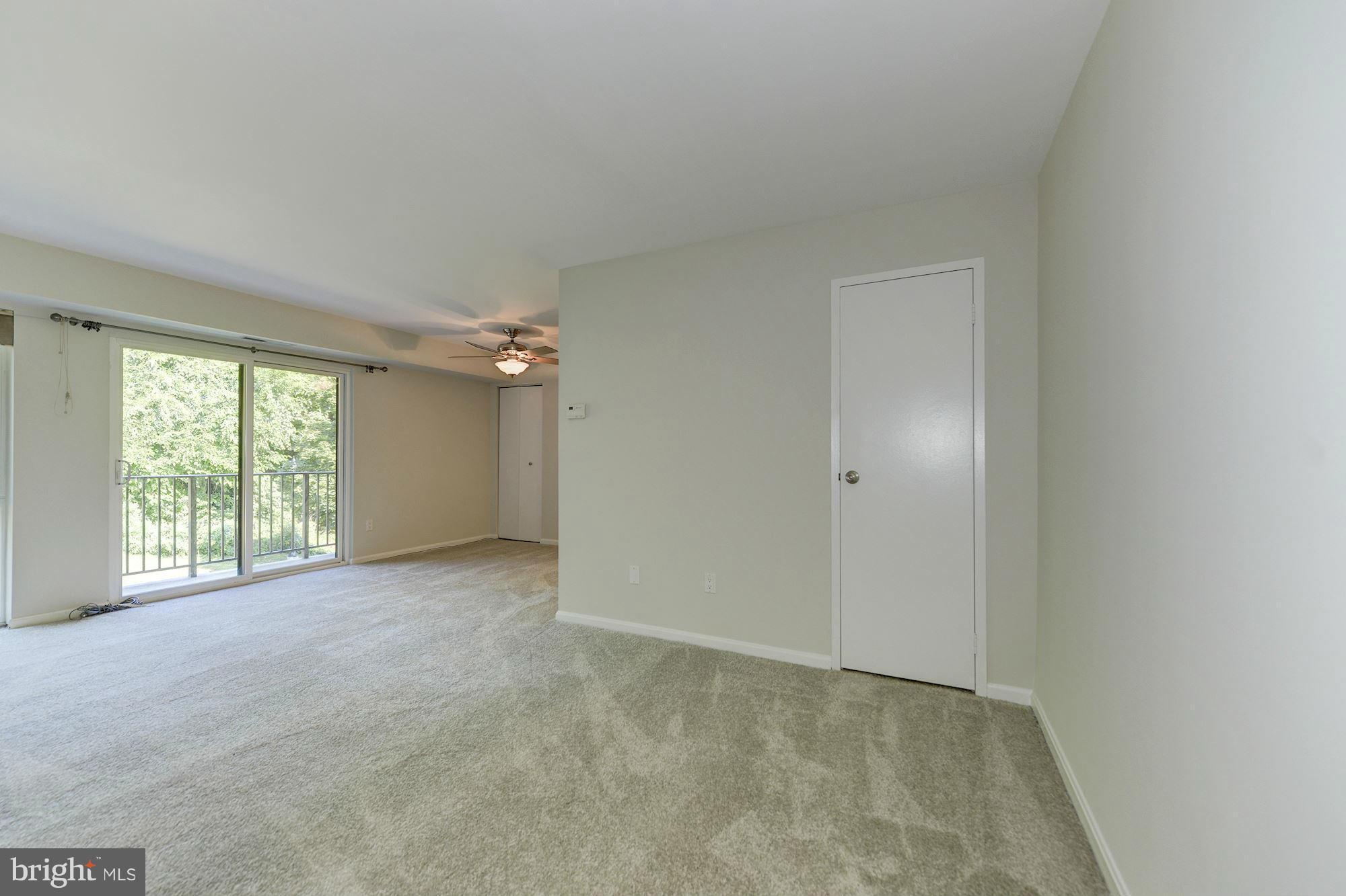 6155 Edsall Road, Unit H Alexandria, VA 22304 - Photo 4 of 30 an empty room with windows