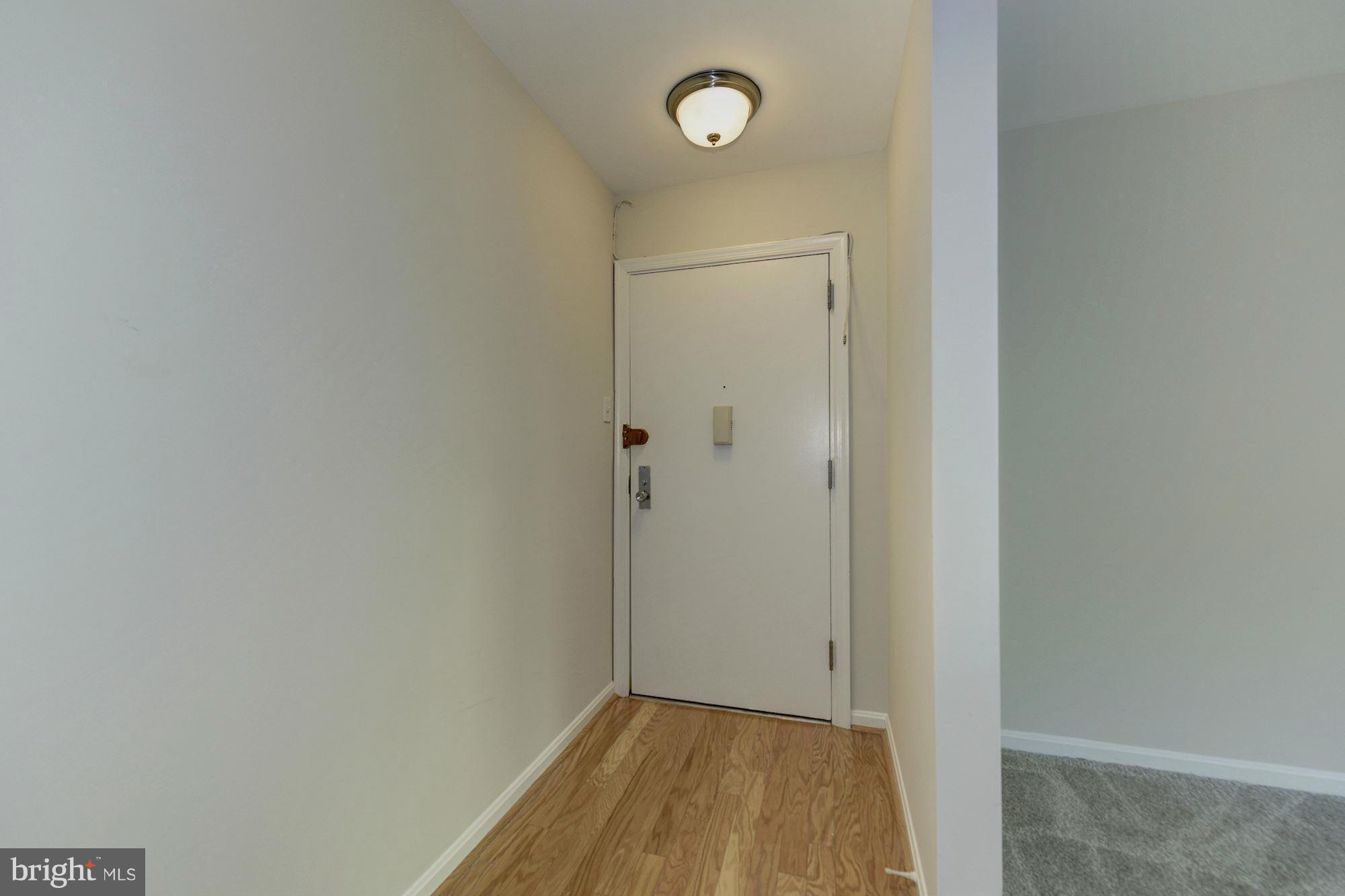 6155 Edsall Road, Unit H Alexandria, VA 22304 - Photo 5 of 30 a view of small space with wooden floor