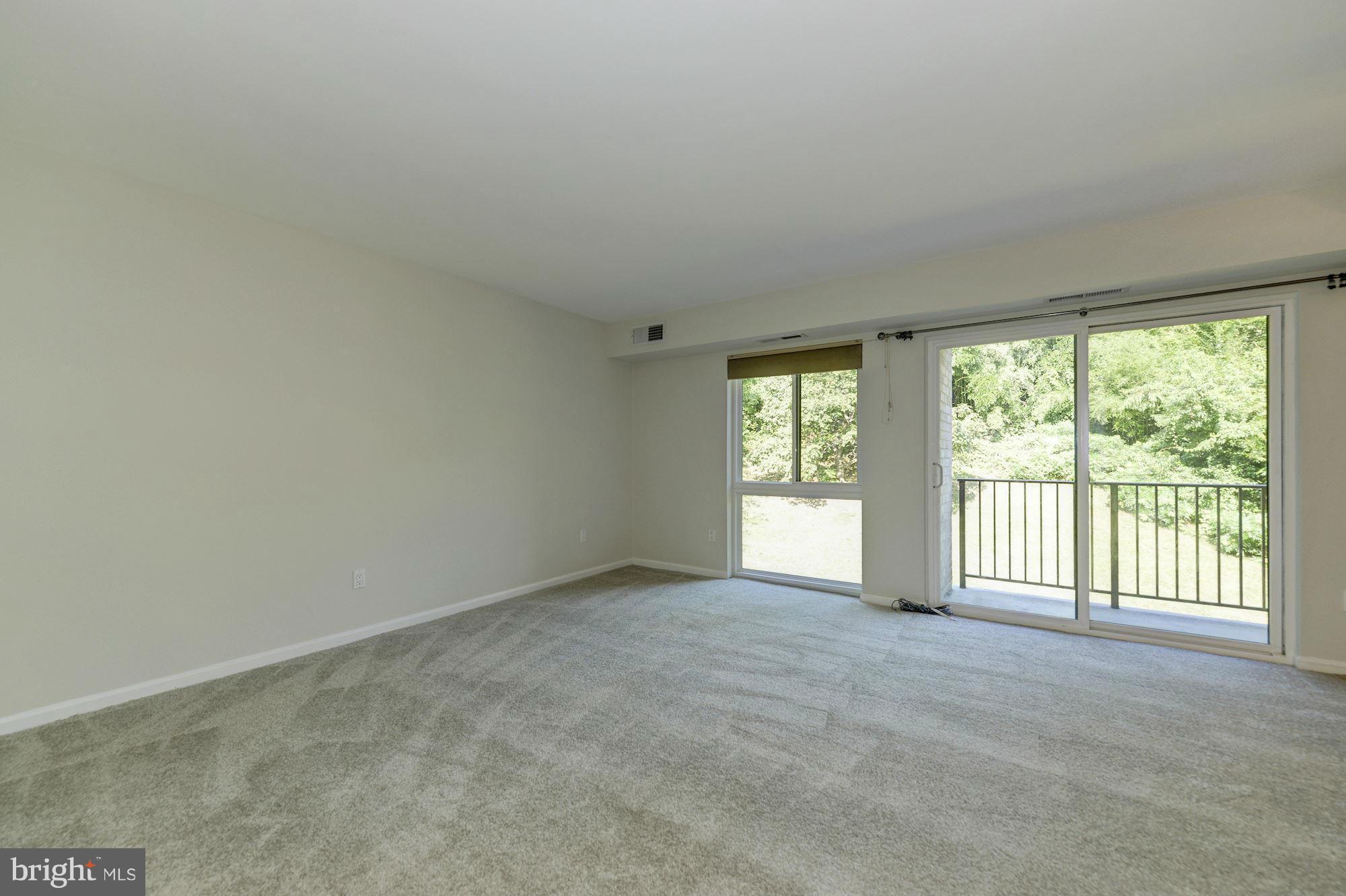 6155 Edsall Road, Unit H Alexandria, VA 22304 - Photo 6 of 30 a view of an empty room with a window