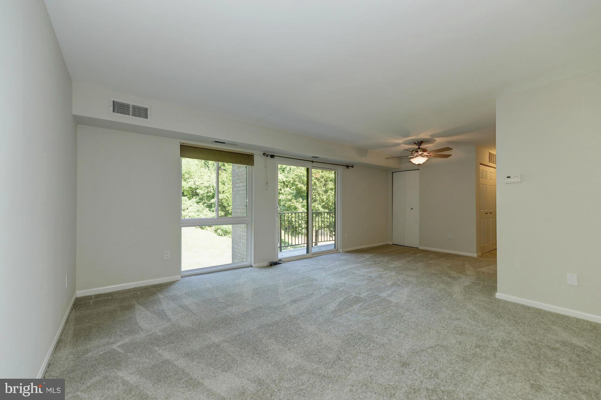 6155 Edsall Road, Unit H Alexandria, VA 22304 - Photo 7 of 30 an empty room with windows