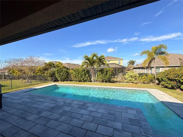 a view of a lake with a big yard