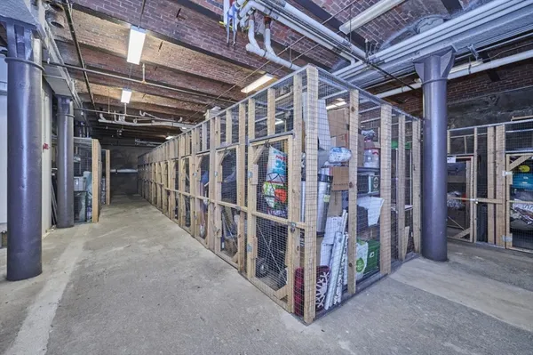 a view of a room with wooden walls