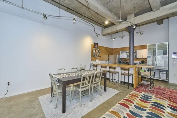 a view of a dining room with furniture