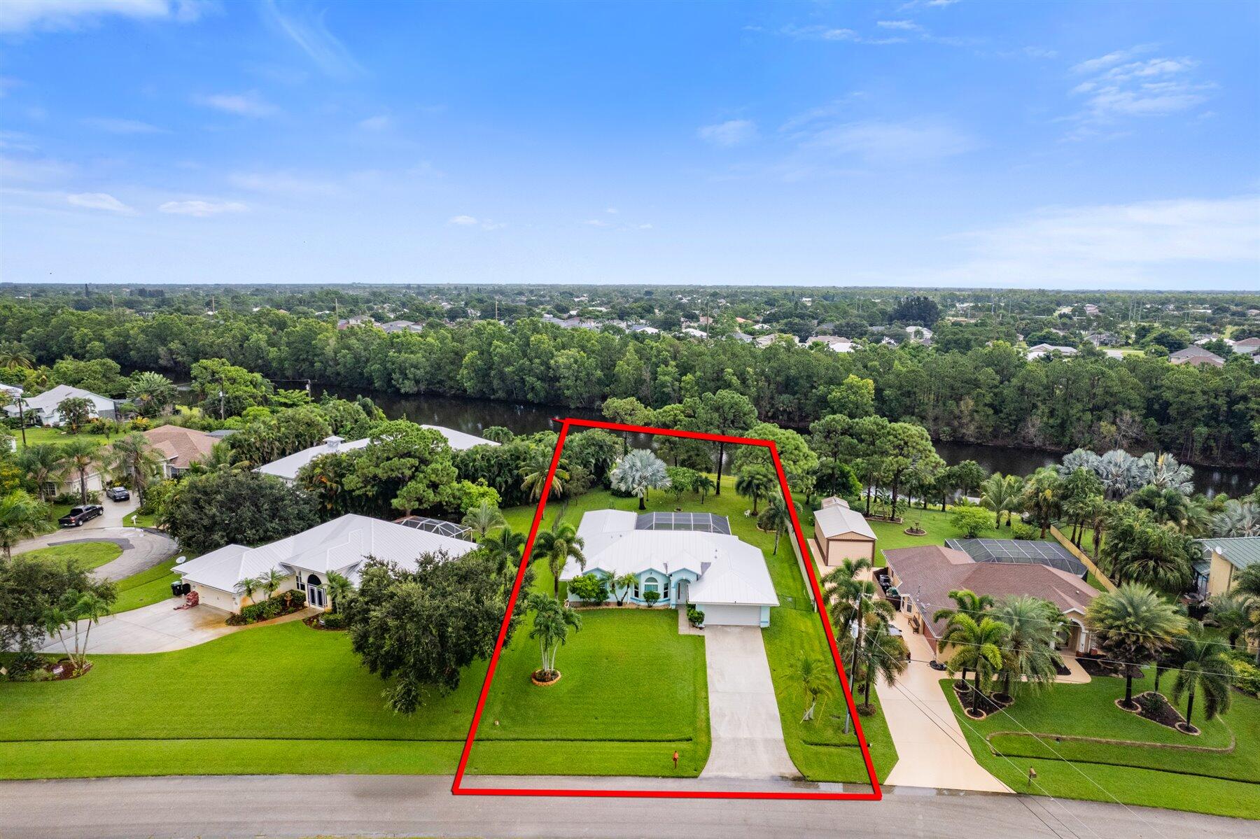 3329 Southwest Crestview Road Port St. Lucie, FL 34953 - Photo 3 of 50 01-DJI_0225-Edit-2