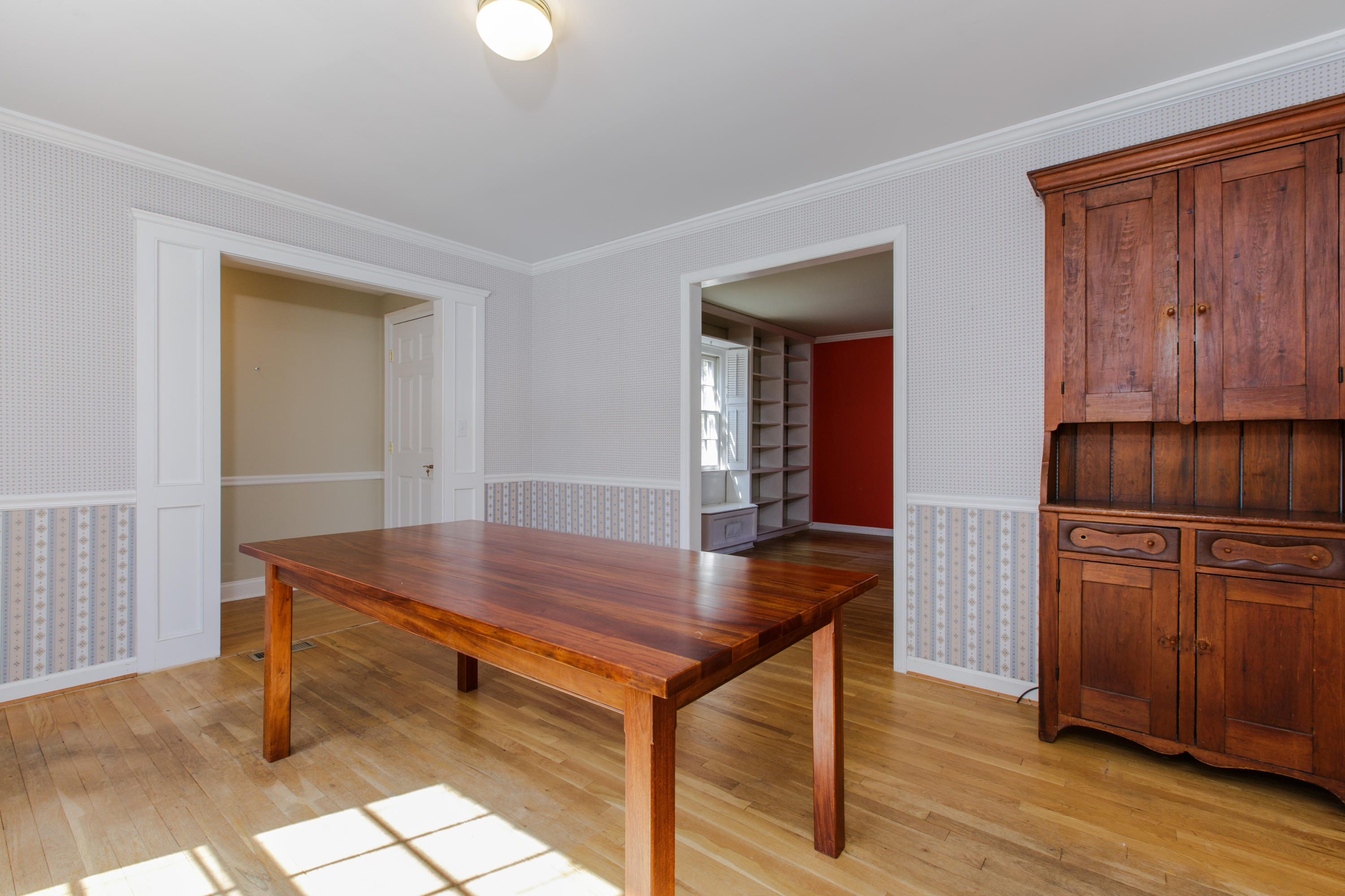 19 Interlaken Road Stamford, CT 06903 - Photo 9 of 21 a room with kitchen island a table and chairs in it