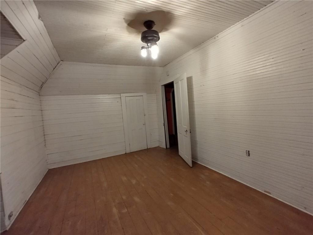 209 Gordon Avenue Calhoun, GA 30701 - Photo 22 of 30 a view of a livingroom with a ceiling fan and window