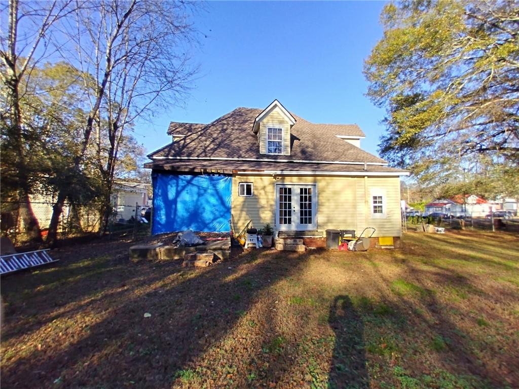 209 Gordon Avenue Calhoun, GA 30701 - Photo 28 of 30 a view of a parked car in front of a house