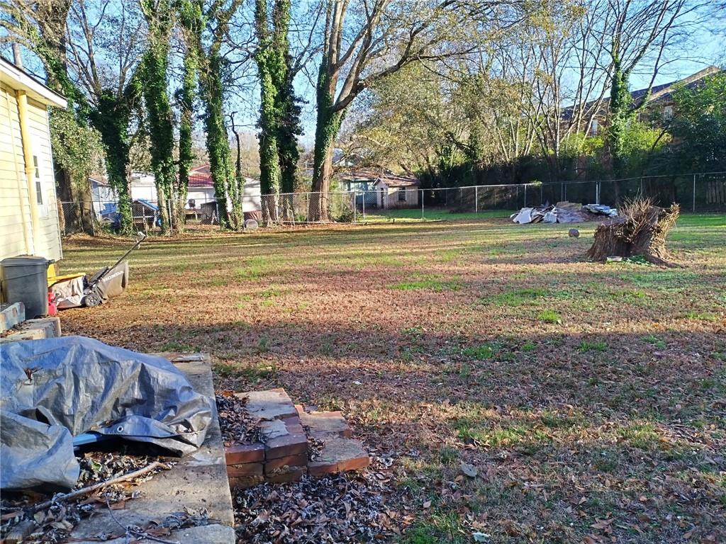 209 Gordon Avenue Calhoun, GA 30701 - Photo 29 of 30 a view of a playground with basketball court