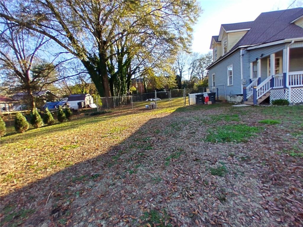209 Gordon Avenue Calhoun, GA 30701 - Photo 4 of 30 a view of a house with a yard