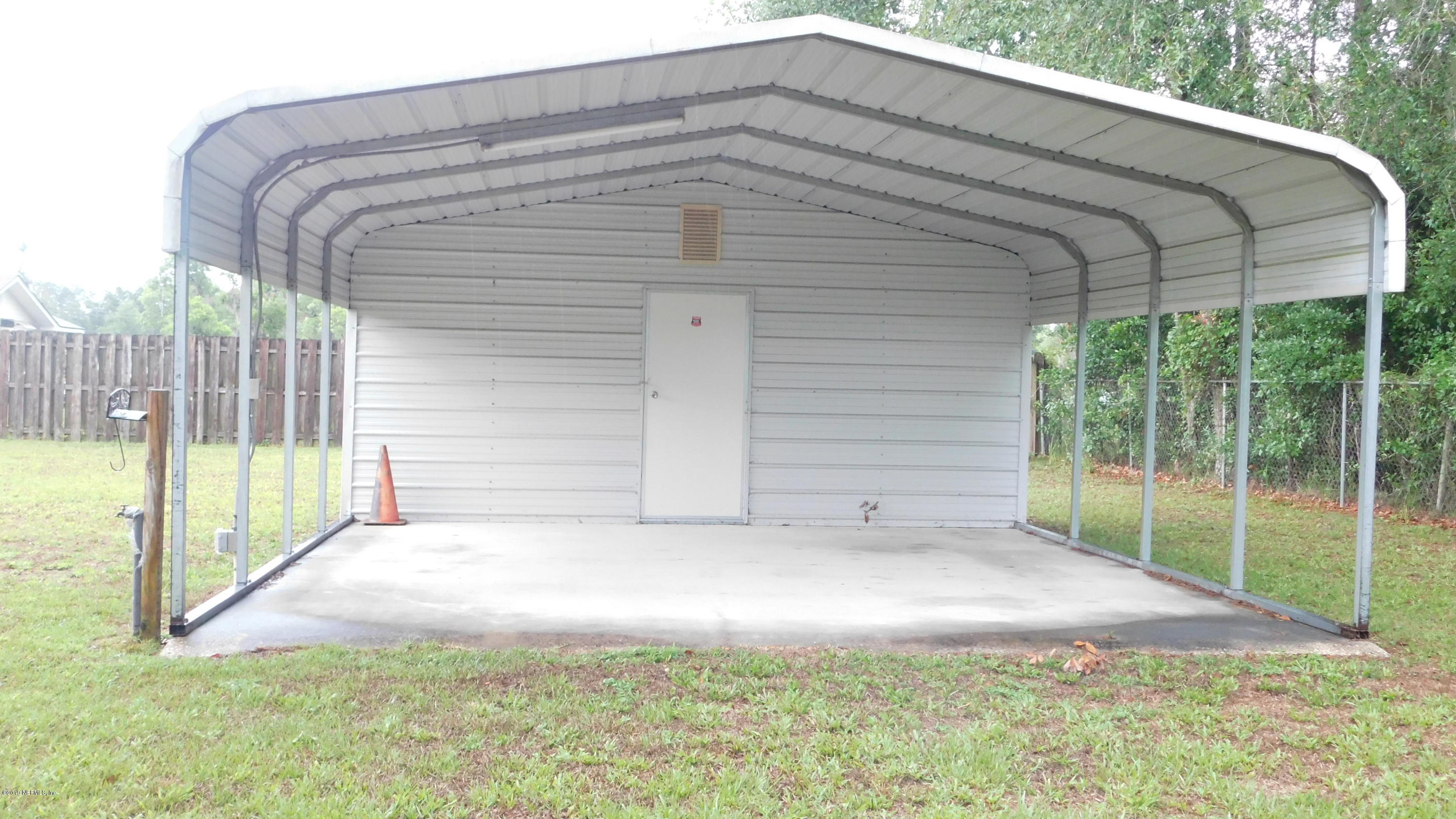 4144 Bronco Road Middleburg, FL 32068 - Photo 60 of 66 a house view with a backyard space