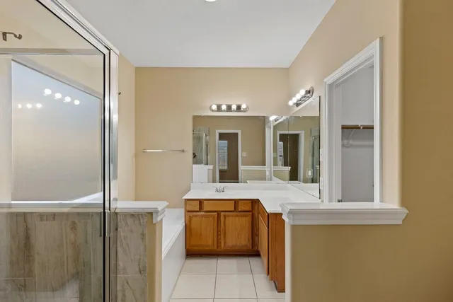 a view of a hallway with washer and dryer