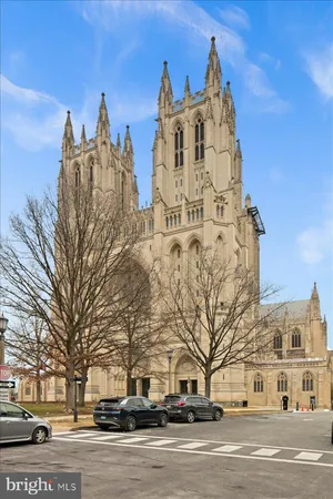a view of a building with a street