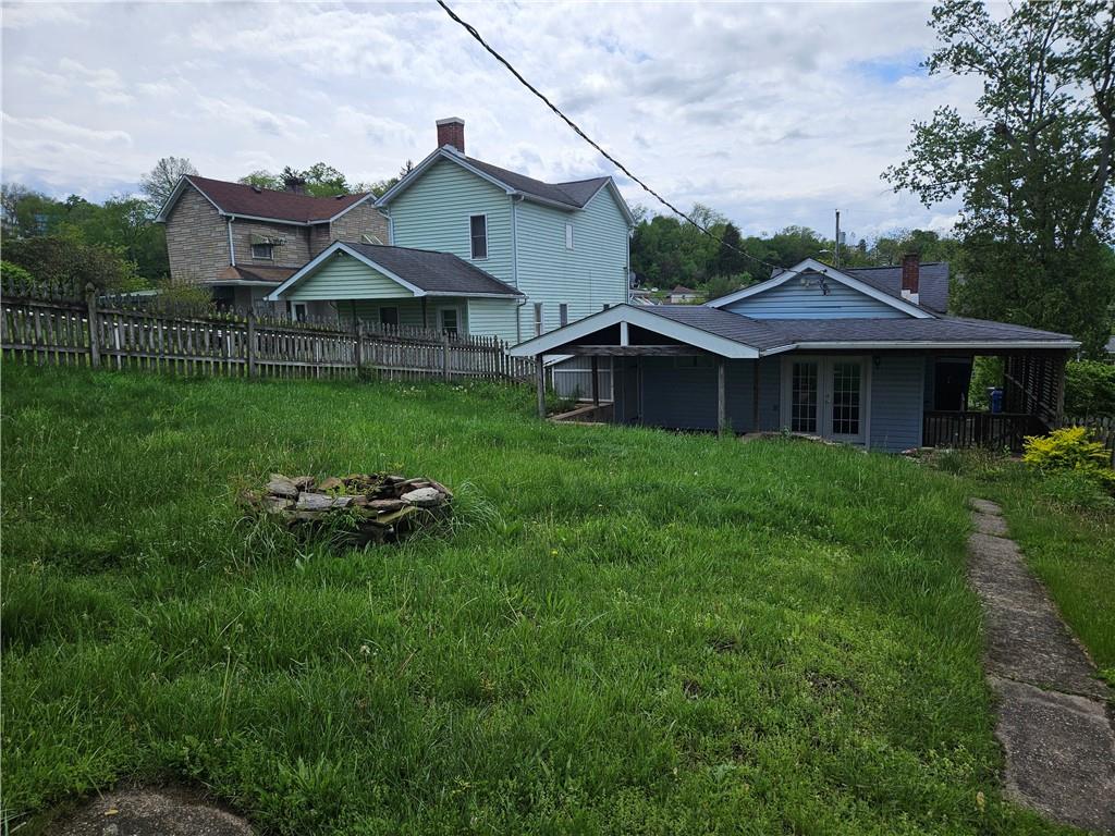 621 Bridge Irwin Pa Irwin, PA 15642 - Photo 29 of 31 a front view of house with yard and green space