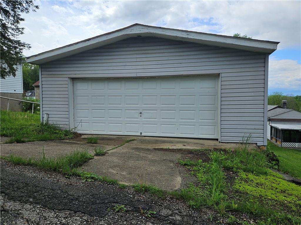 621 Bridge Irwin Pa Irwin, PA 15642 - Photo 31 of 31 a front view of a house with garden