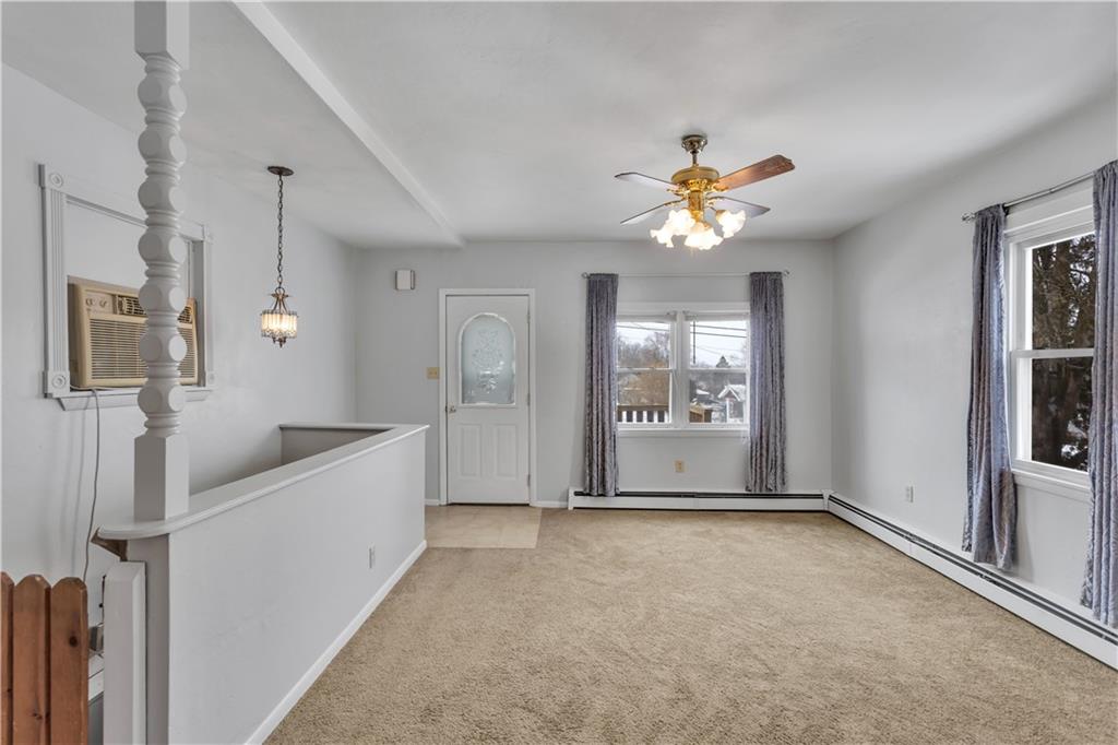 621 Bridge Irwin Pa Irwin, PA 15642 - Photo 5 of 31 a view of an empty room with window and cabinet
