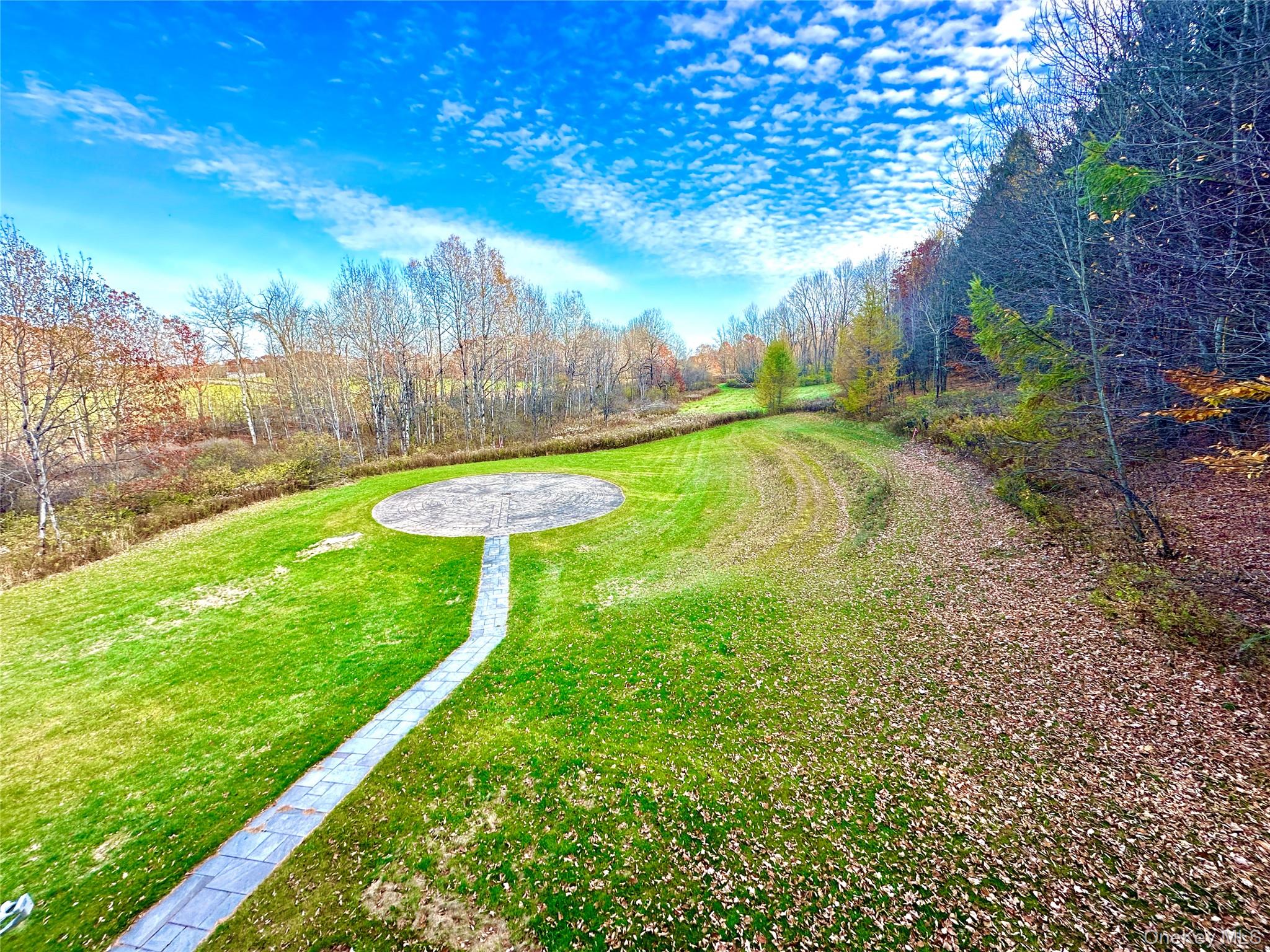742 New Turnpike Road Sherburne, NY 13460 - Photo 14 of 15 a view of a backyard with swimming pool