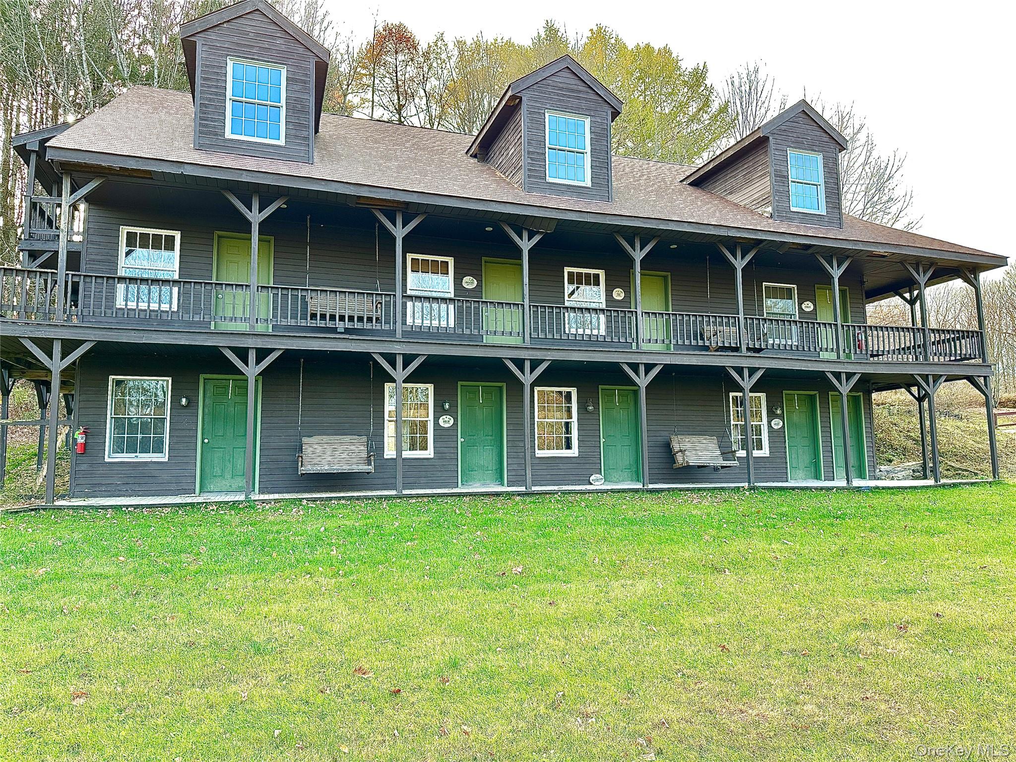 742 New Turnpike Road Sherburne, NY 13460 - Photo 4 of 15 a front view of a house with a garden