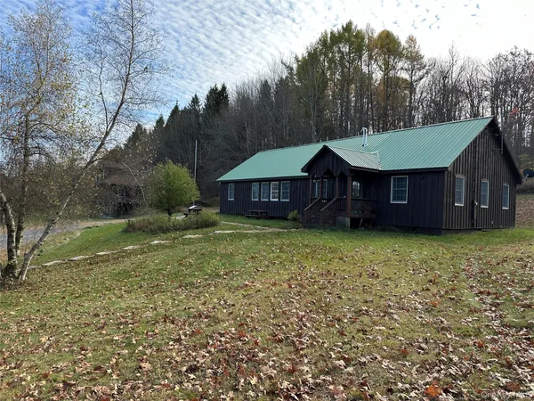 a house view with a garden space