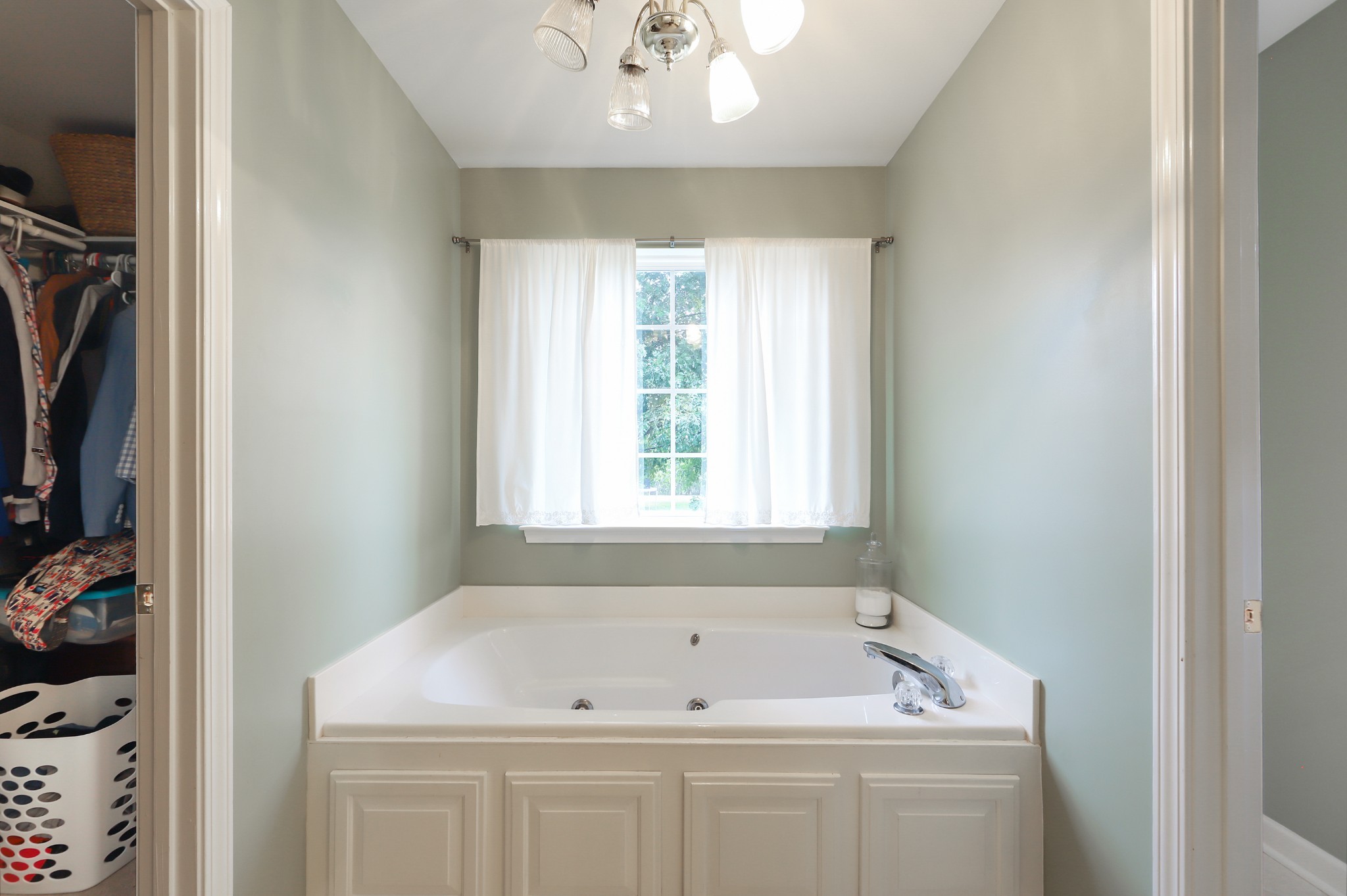 1400 Camp Ravine Road Burns, TN 37029 - Photo 23 of 40 a bathroom with a sink a window and a shower