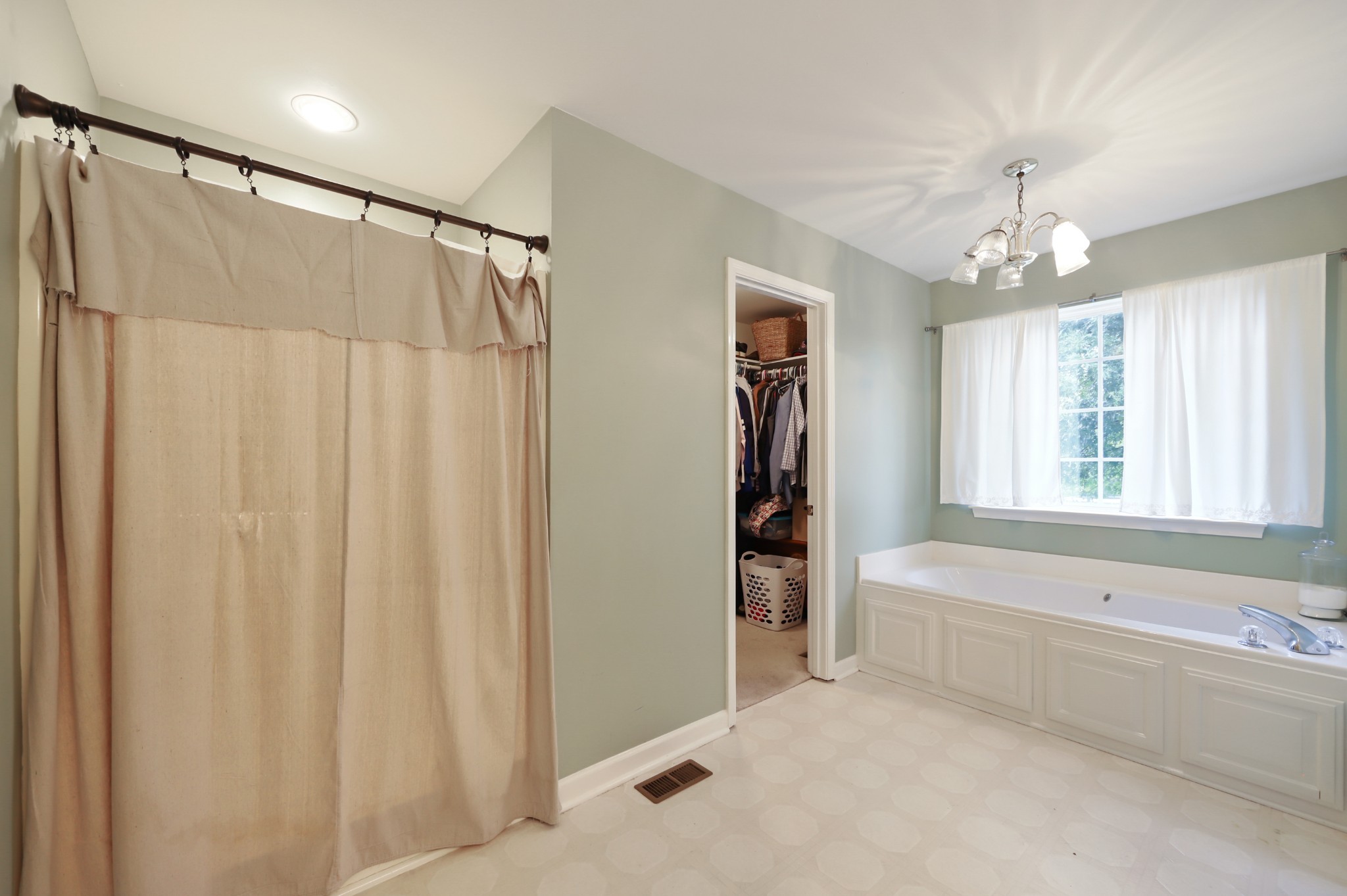 1400 Camp Ravine Road Burns, TN 37029 - Photo 24 of 40 a bathroom with a bathtub and a shower