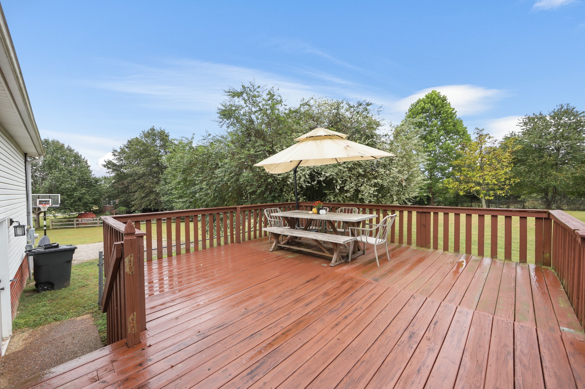 1400 Camp Ravine Road Burns, TN 37029 - Photo 31 of 40 a view of balcony with wooden floor and outdoor seating