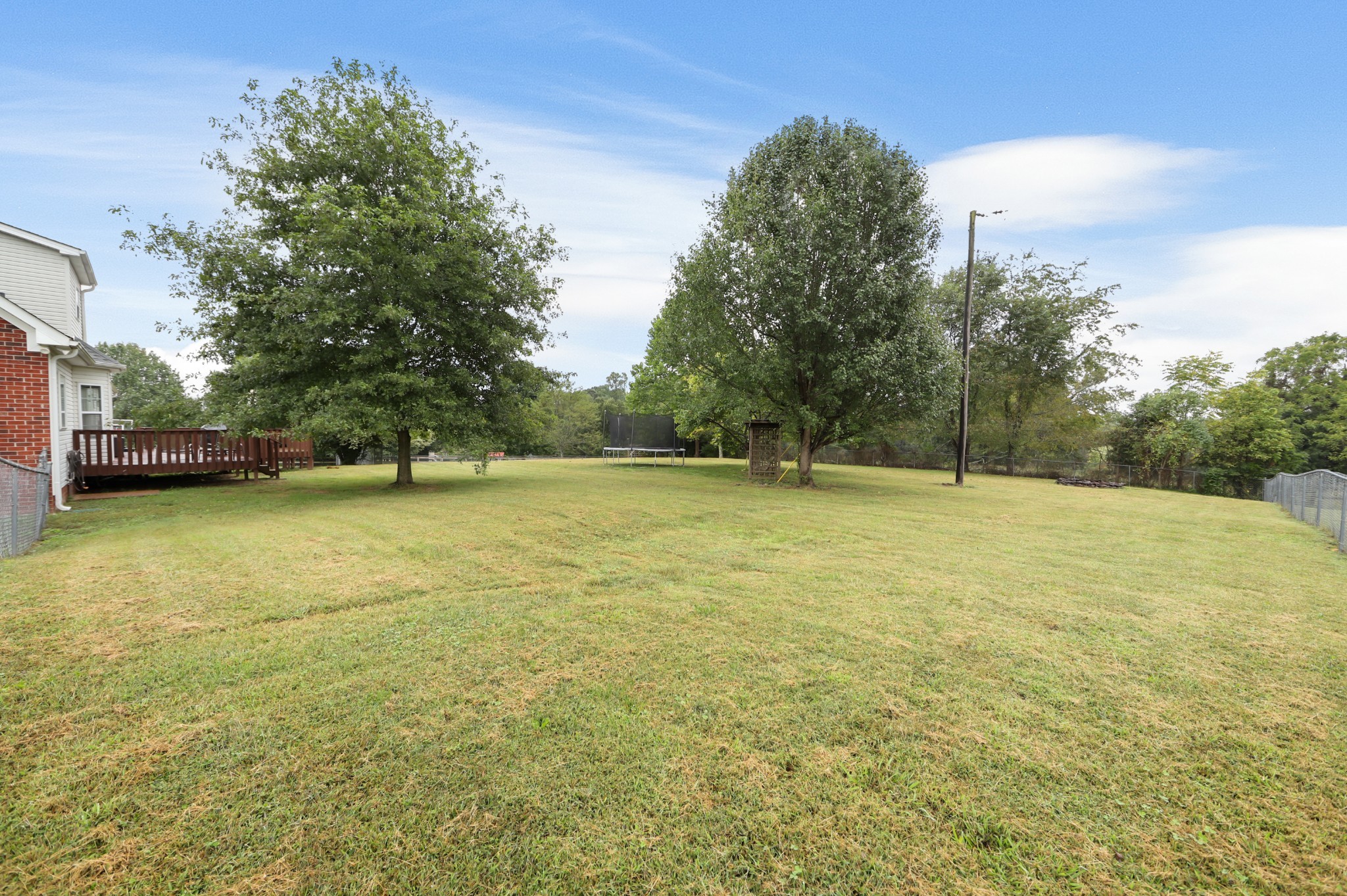 1400 Camp Ravine Road Burns, TN 37029 - Photo 35 of 40 a view of outdoor space with deck and yard