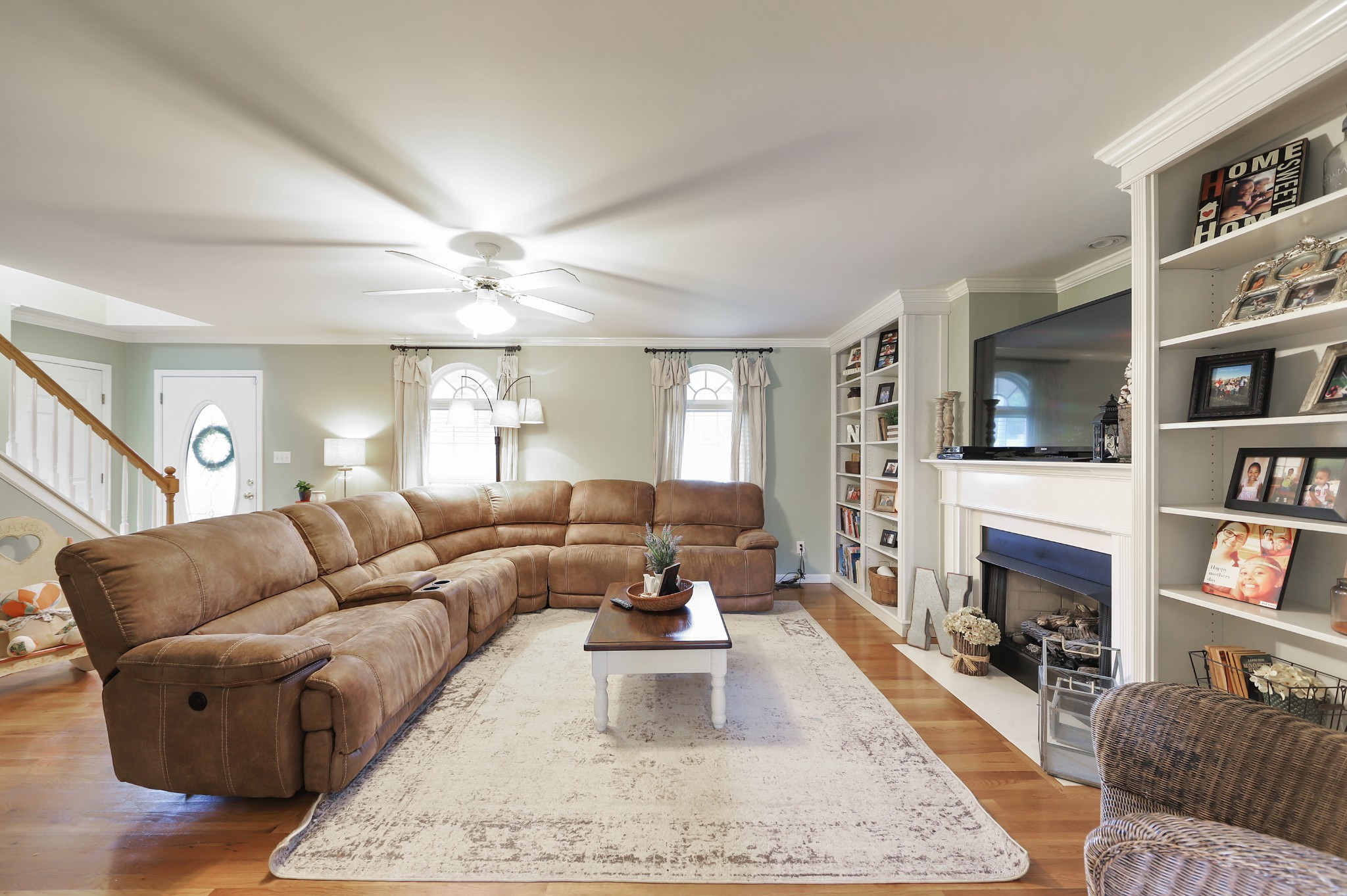 1400 Camp Ravine Road Burns, TN 37029 - Photo 10 of 40 a living room with furniture fireplace and flat screen tv