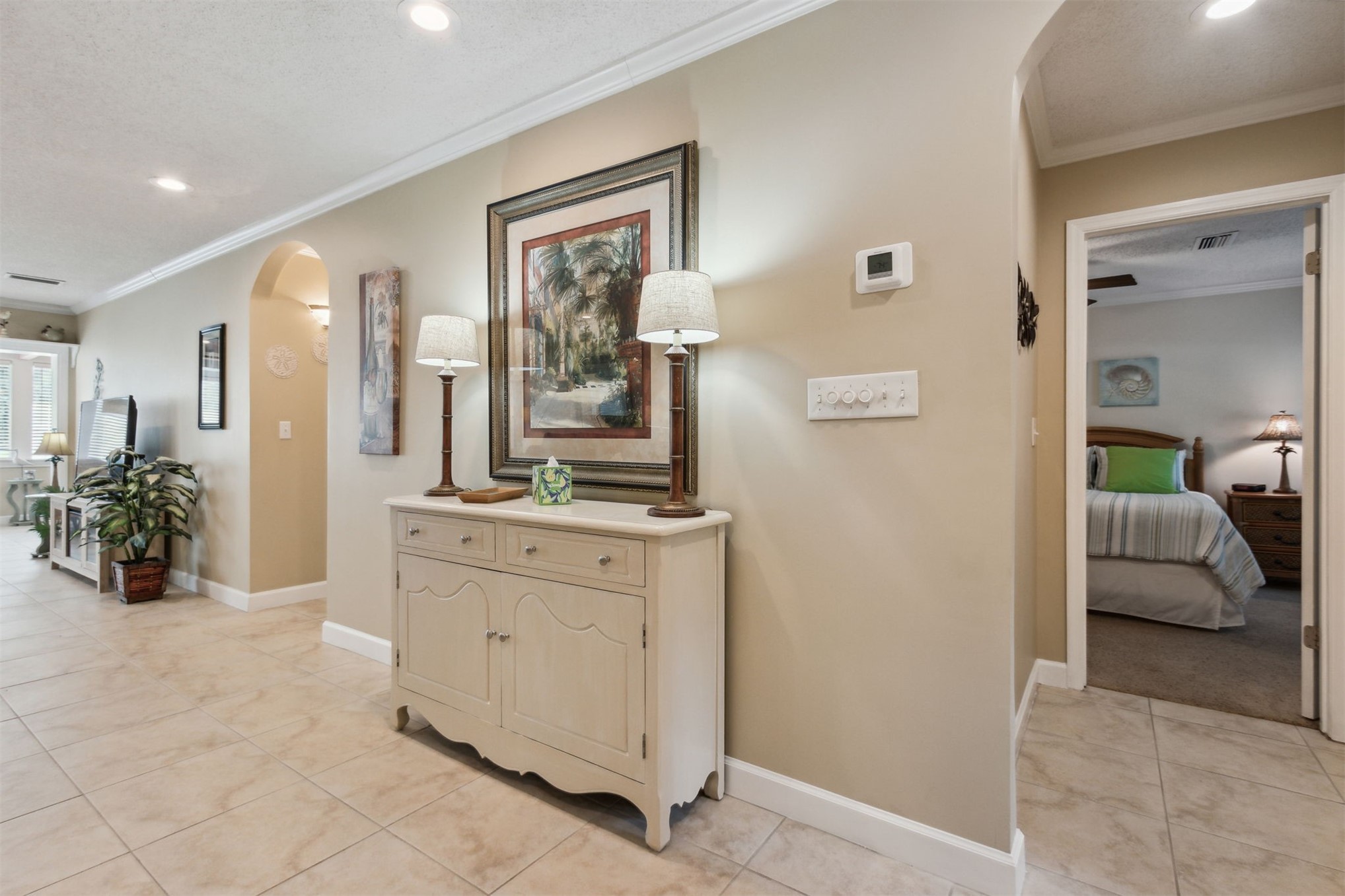 3327 Sea Marsh Road, Unit 3327 Fernandina Beach, FL 32034 - Photo 3 of 39 a en suite bathroom with a double vanity sink and a mirror