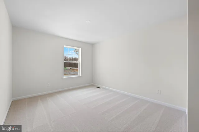 a utility room with sink dryer and washer