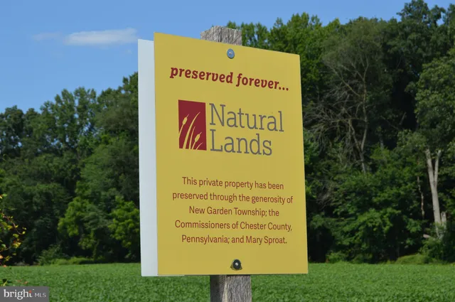 a sign on the side of the road