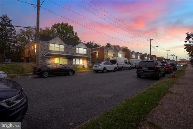 a view of a street with cars